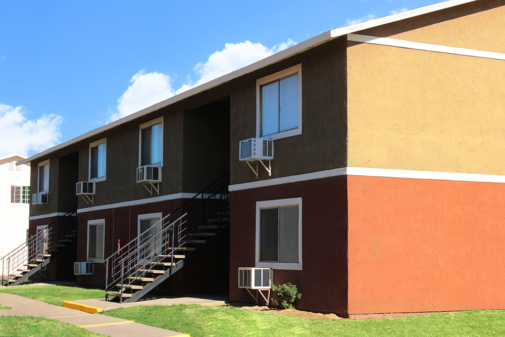 This image displays exterior photo of Villa De La Rosa Apartments